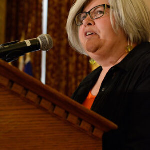 Alison Norberg accepts the ML&L Outstanding Volunteer Award.